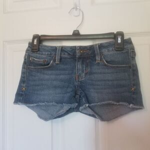 Tilt Cut Off Raw Fringe Hem Medium Acid Wash Blue Denim Jean Shorts Size 0
